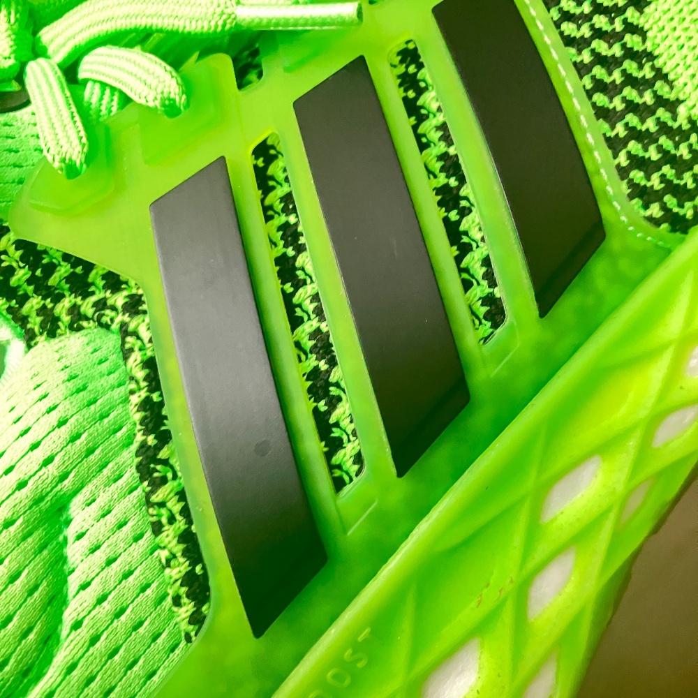 Neon green adidas sneakers